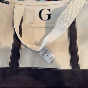 Brand new Lands end medium tote with “G” monogram.